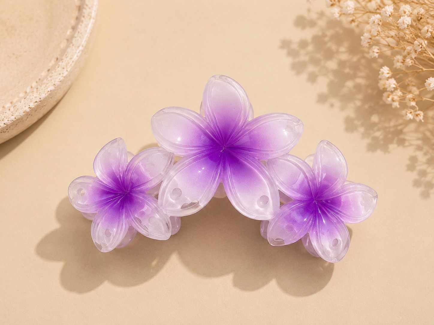 Pinza de flores morada